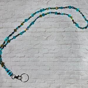 Blue and teal ocean themed handcrafted lanyard